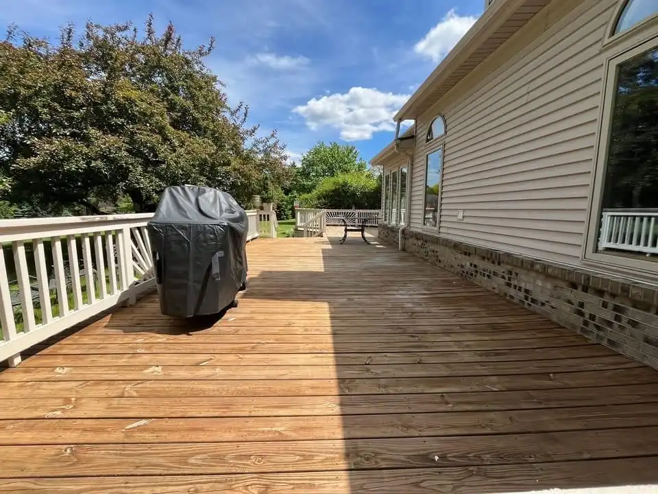 Wood deck restoration after soft washing in Saline MI